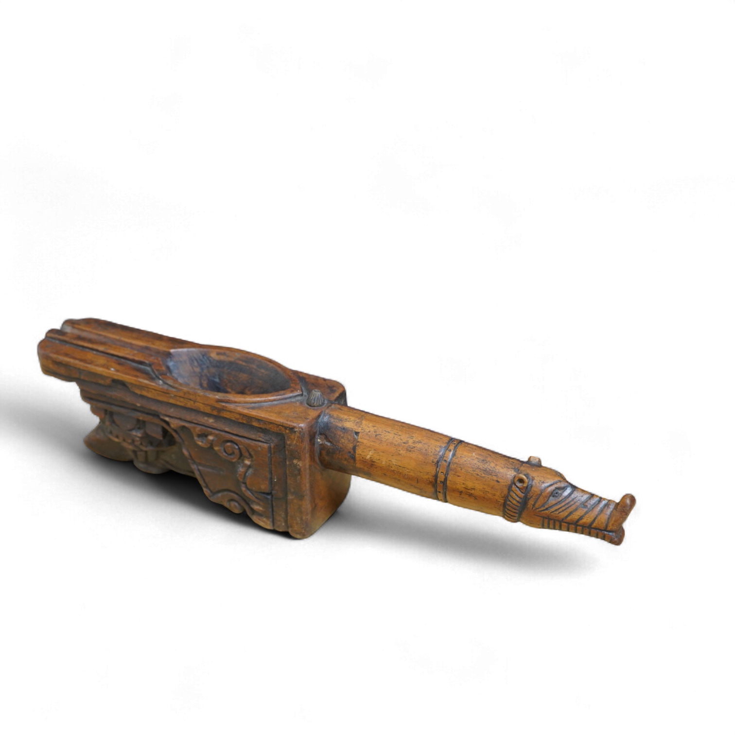 An 18th / 19th century Indian carved wood oil pourer, 43cm